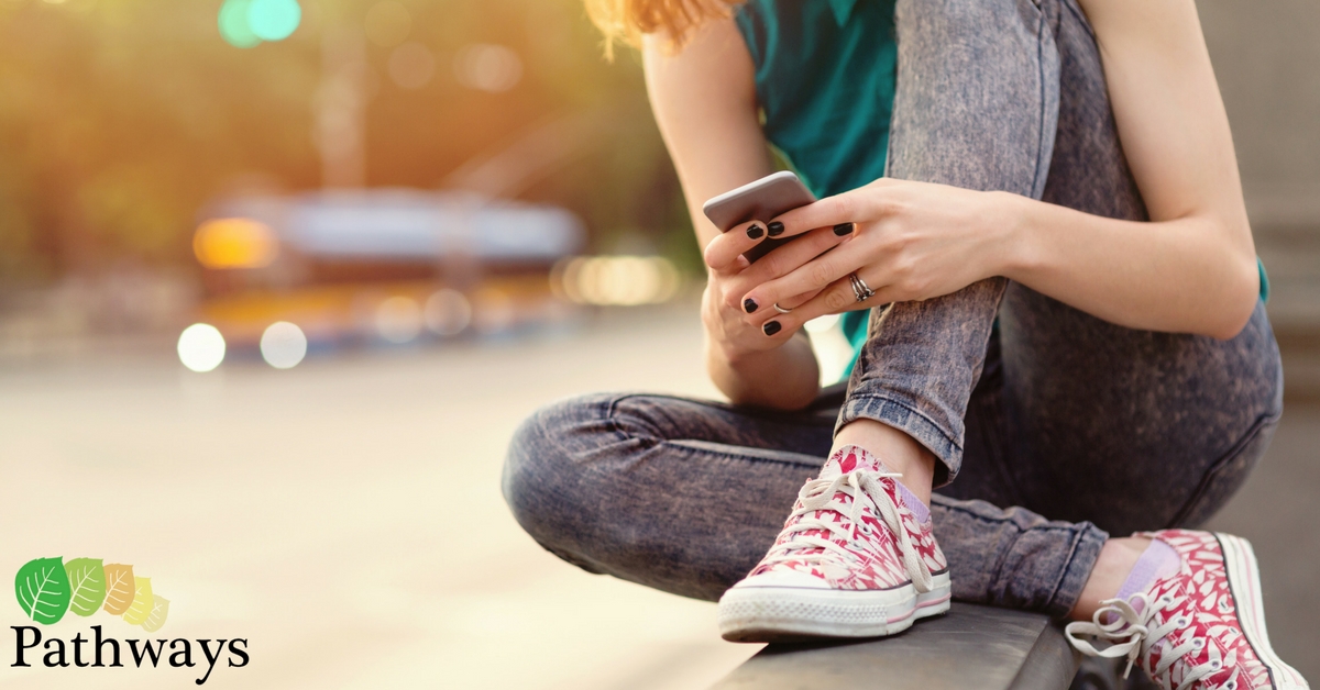 Girl on a Mobile Phone - Teenagers and Suicide Prevention - Pathways Real Life Recovery in Utah